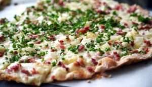 Making Flammkuchen at home requires only a handful of ingredients